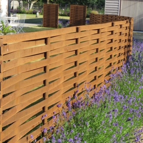 This visually stunning Corten Steel bespoke hand-woven fence is a new addition to our product range for 2021.